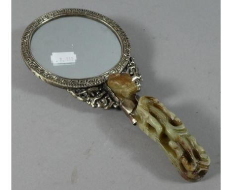 A Reproduction Chinese Hand Mirror with Faux Jade Handle and Back Decorated with Dragons Chasing Flaming Pearl and Two Caboch