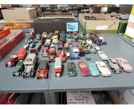 A collection of Dinky, Corgi, Matchbox, Lesney, Yesteryear and similar playworn diecasts including Corgi Aston Martin DB4 wit