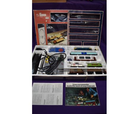 A Lima 00 gauge Pipe Unloader Train Set 1107A comprising of a Diesel Locomotive, wagons and cars, appears complete, in origin