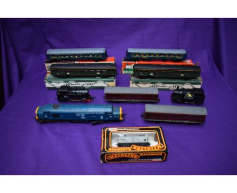 A collection of 00/HO scale including Hornby diesel locomotive D6830, two French Hornby Coaches 733 &amp; 734 both boxed, two