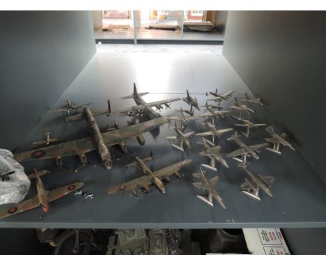 Fourteen Royal Hampshire pewter models of various Fighter Planes including Hurricane, Hawk, Victor etc all on stands along wi