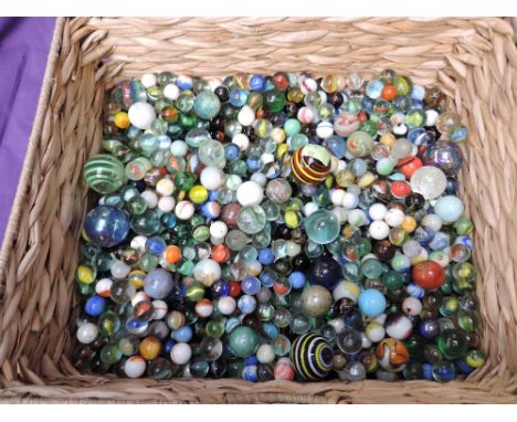 A large collection of mixed vintage glass marbles, various sizes, colourways and styles including two Twist Stem Marbles