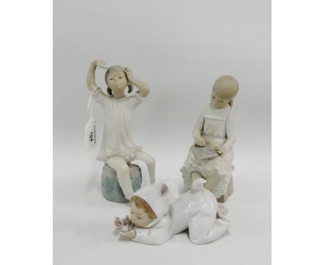 Lladro bisque figure, a Nao porcelain figure of a child in a rabbit suit and another figure, (3) 