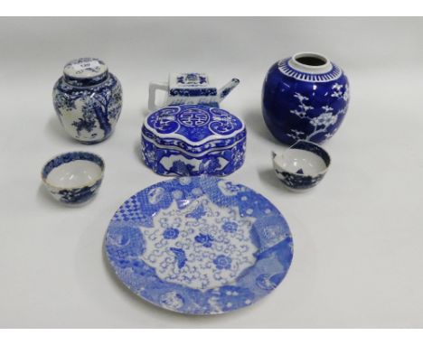 Two Chinese blue and white tea bowls, (one a/f) together with a prunus patterned ginger jar, a small blue and white teapot, a