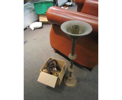 A gilt electric desk light, a wrought iron door knocker in the form of a dragon and tall brass candlestick 