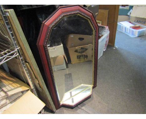 A bevel edged wall mirror with mirrored shelf 