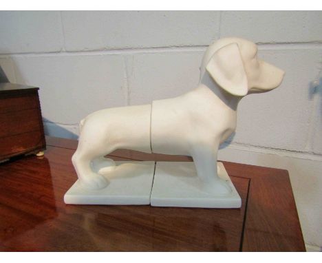 A pair of white ceramic Dachshund dog bookends 