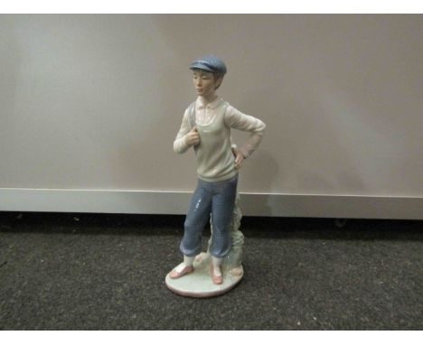 A Nao golfing figure, 28cm tall