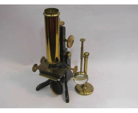 A mahogany cased Collins of Great Portland Street microscope with various lenses
