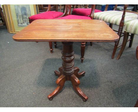 A mahogany lamp table on turned column and quatreform base, 54cm x 51cm x 37cm