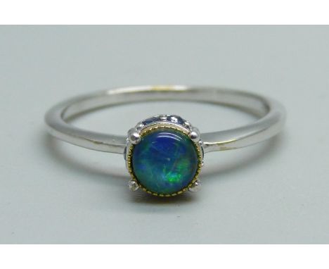 A 9ct white gold and opal ring set with ten sapphires, 2.1g, Q 