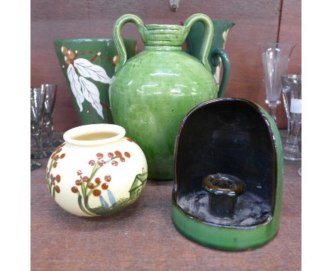 A Brannan green glaze trumpet vase, an Aller Vale Arts and Crafts style vase, candlestick, two handled pot and one other smal