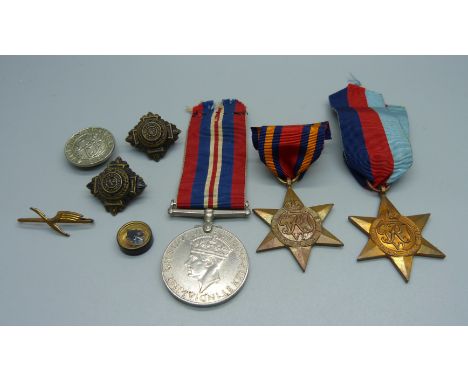 WWII medals and a pilot's escape compass 