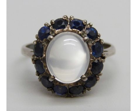 A silver set, moonstone and sapphire ring, R 