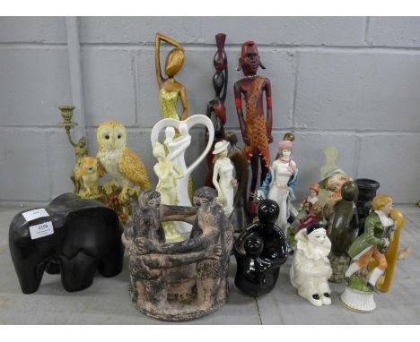 A collection of figures, including an elephant, a brass candlestick, model of owls, etc. (22) **PLEASE NOTE THIS LOT IS NOT E
