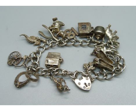 A silver charm bracelet, 52g 