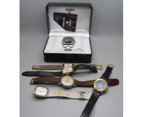 Six wristwatches including a vintage Timex 