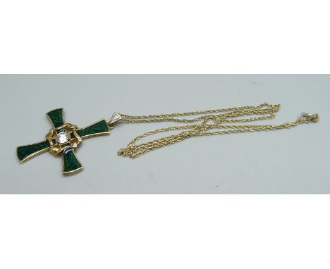 A silver gilt and green enamel Celtic style cross on chain 