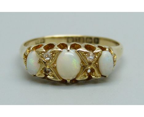 An 18ct gold, opal and diamond ring, lacking one diamond, 3.5g, Q 