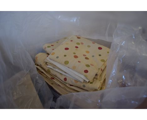 BAG CONTAINING MODERN CURTAINS IN CREAM AND MULTI-COLOURED DOT DESIGN
