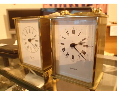 Brass Weiss clocks carriage clock with quartz movement and a brass Kienzle carriage clock  CONDITION REPORT: Both require bat