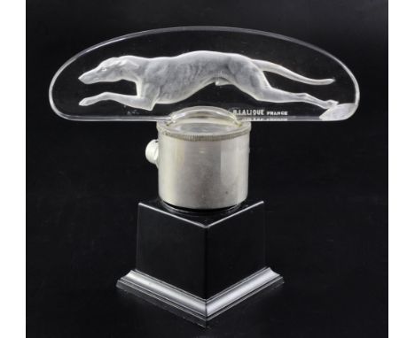 Levrier/Greyhound. A glass mascot by René Lalique, introduced on 14/3/1928, No.1141 in clear and frosted glass, signed relief
