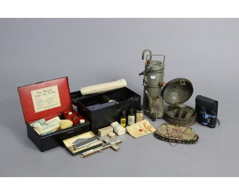 A vintage japanned-metal six-division spice tin, 6¼” diameter; two japanned-metal first-aid boxes; a Hohner harmonica; &amp; 