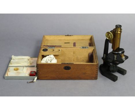 A vintage R &amp; J Beck’s brass &amp; black lacquered monocular microscope (No. 11993); with various accessories &amp; slide