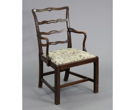 A Georgian style mahogany elbow chair with a pierced ladder back, padded drop-in-seat, &amp; on square chamfered legs.