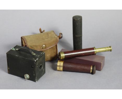 A vintage brass two-draw pocket telescope, 16¼” long, with travelling case; a “Super Seadog” pocket telescope, boxed; &amp; a