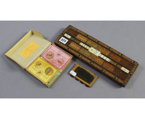 A vintage Thom De La Rue “Bezique” card game, boxed; a Goodall &amp; Son’s “Camden” whist marker; &amp; an inlaid-wooden crib