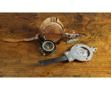 A WWI British black lacquered brass Verner’s patent pocket compass (1918); with a tan leather travelling case; together with 