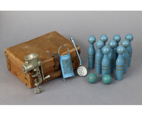 A vintage “Hotdog” mincer, 5” high; a small enamelled grater &amp; ladle; &amp; a painted wooden child’s skittle game