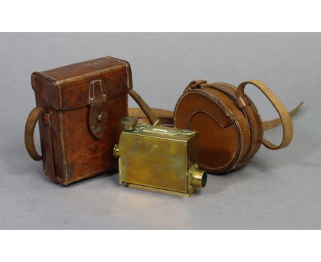 A WWI British brass sight instrument (Mark III No. 635), by Troughton &amp; Simms of London, (1915), 4½” wide, with a tan lea
