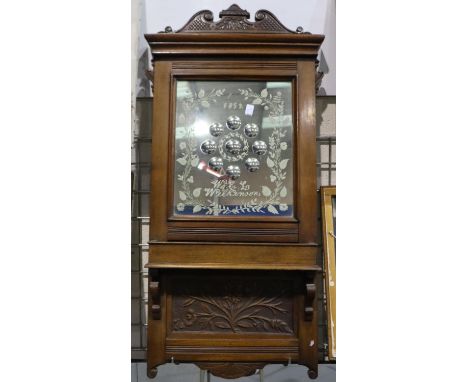 A Victorian walnut framed hall mirror, the glass etched, dated 1892 and named to WEL Wilkinson, overall 43 x 97 cm H. Not ava