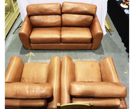 A contemporary tan leather three piece lounge suite, sofa L: 210 cm, leather a little sun bleached, no visible damages, overa