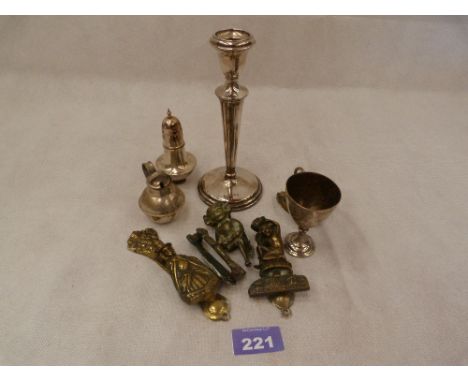 A silver loaded candlestick, silver pepperette, various plate and small brass knockers