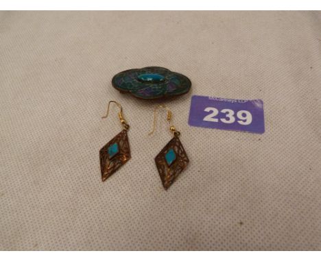 A pair of silver gilt enamel earrings and an enamel brooch