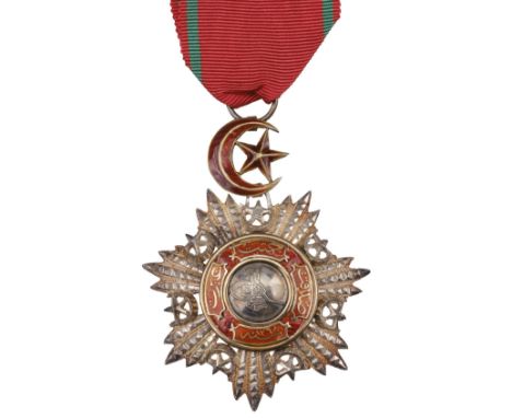 * Turkey, Order of the Medjidie, Fourth Class breast badge, silver, gold and enamel, chip to red enamel centre, 56 mm diamete