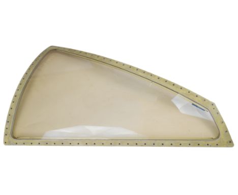 * BAC TSR2. The portside cockpit window from a TSR2 circa 1960s, curved anti-nuclear gold tinted glass with metal frame finis