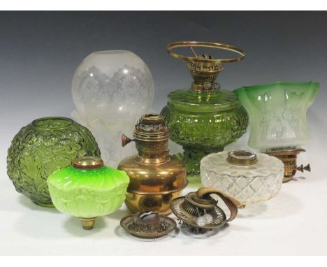 A collection of Victorian oil lamp reservoirs and shadesCollection of dust, markings and scratches throughout commensurate wi