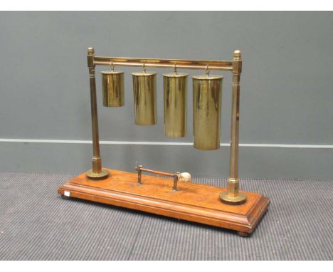 Trench Art - a gong formed as four shells on an oak base