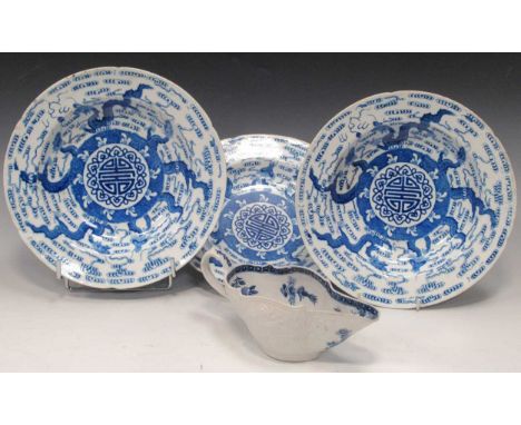 Three 18th century Worcester blue and white bowls, W script marks; an 18th century Worcester blue and white moulded sauceboat