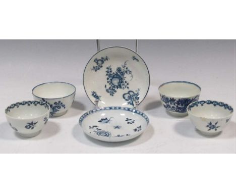 A Caughley blue and white tea bowl and saucer, three 18th century Worcester tea bowls and saucers and a Liverpool blue and wh