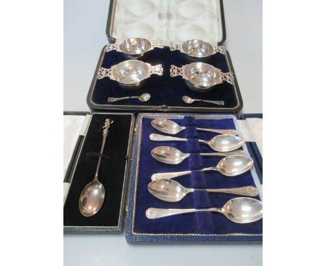 A cased set of six silver teaspoons, a cased set of four silver salts, a cased silver spoon and a silver napkin ring, 8.3ozt 