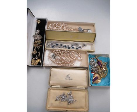 Two jewellery boxes with a quantity of costume jewellery, together with two silver pocket watches, five wrist watches, a brus