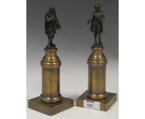 A pair of bronzed figures of Shakespeare and Milton, each surmounted on a gilt metal column base
