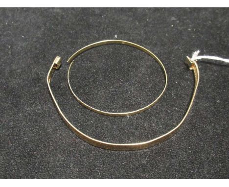 A bracelet stamped '14Kt', together with a split bangle stamped '585', gross weight 20.3g (2)