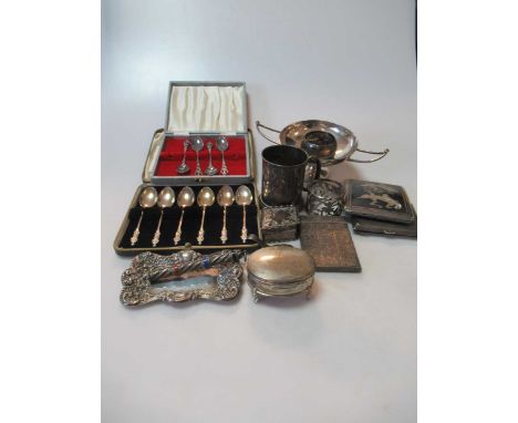 A silver card case, 2 silver trinket boxes, 2 silver napkin rings, a silver christening tankard, a silver caddy spoon, a silv