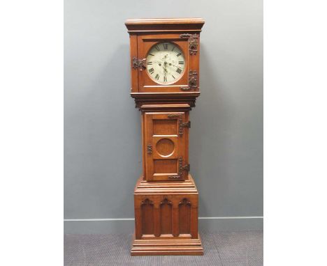 A 19th century Gothic oak longcase clock with an associated arched dial inscribed Henry Steward York, 225cm high